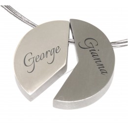 Two-part pendant made of stainless steel with individual engraving, 25mm diameter before division