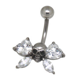 Belly button piercing with skull motif and crystal wings