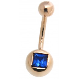 9k gold belly button piercing with dark blue crystal below