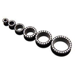Ear tunnels made of black acrylic with crystals in many sizes