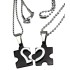 Partner pendant "Puzzle with a heart motif on the front" made of black PVD-coated stainless steel with an individual engraving 