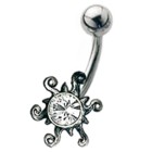 Belly button piercing with silver design - the sun is shining