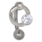 Navel piercing with clear crystal, cleverly clamped