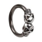 Front closure ring with 925 sterling silver clasp and two skulls