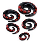Organix ear stretchers made of water buffalo horn in black and red