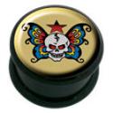 Plastic picture plug with a skull and wings motif