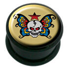 Plastic picture plug with a skull and wings motif