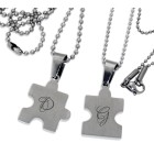 Partner pendant - puzzle heart motif on the front with an individual engraving on the back