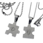 Partner pendant - puzzle heart motif on the front with an individual engraving on the back