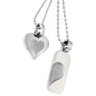 Partner pendant made of stainless steel, with a rough heart indentation