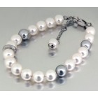 Stainless steel bracelet with faux pearls