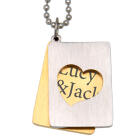 Two-piece stainless steel pendant with heart cut-out and personal engraving