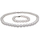 Necklace with bracelet consisting of white patent pearls