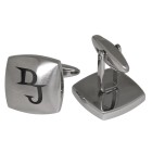 Cufflinks made of matted stainless steel, slightly curved with engraving
