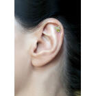Helix ear piercing with a tribal design 16