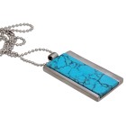 Stainless steel pendant with striking turquoise inlay