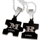 Puzzle with a heart motif on the front -cpartner pendant made of stainless steel PVD coated black with an individual engraving 