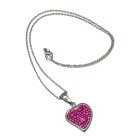 Heart-shaped pendant made of stainless steel with pink crystals