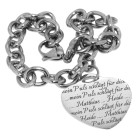 Stainless steel bracelet with a conspicuous heart pendant and engraving of your choice