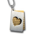 Two-piece stainless steel pendant with heart cut-out and personal engraving