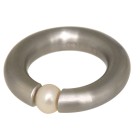 Steel ring with a creamy-white faux pearl