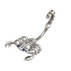 Belly button piercing made from a 1.6x10mm steel banana with a plastic 925 silver scorpion design