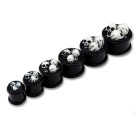 Silicone plug black with three skulls in different strengths