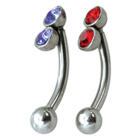 Double crystal eyebrow piercing at the top