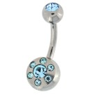 Belly button piercing with 6 mini crystals circling around a large crystal